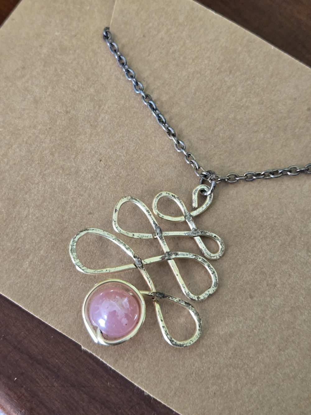 Silver-Tone Swirl Pendant Necklace with Pink Glass Accent